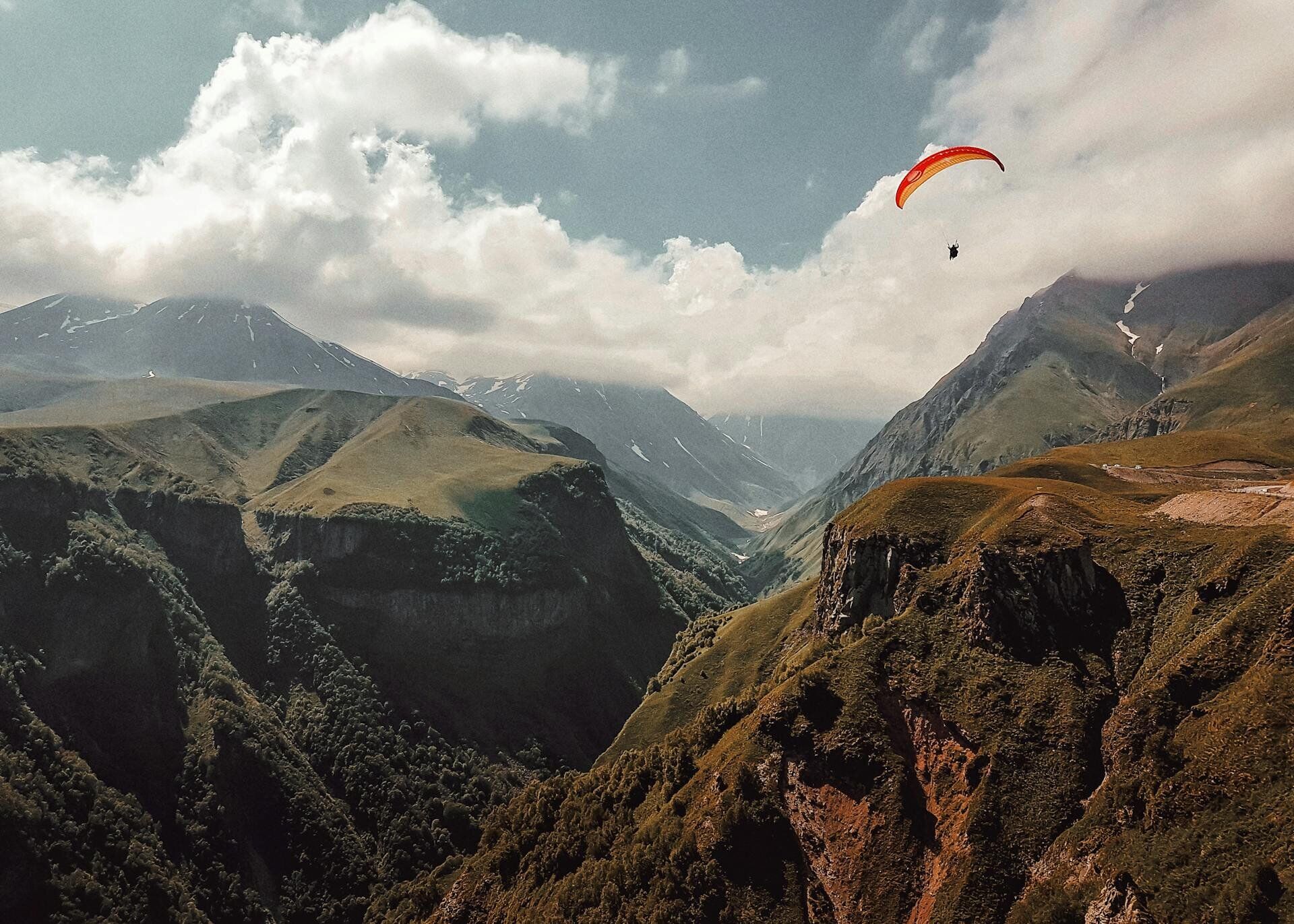 Paragliding over mountains